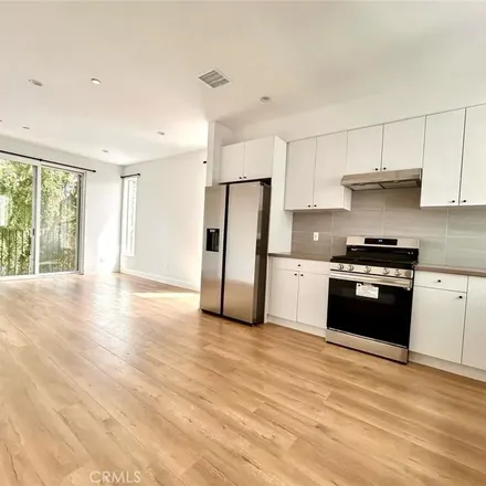 Rent this 4 bed apartment on 163 North Hoover Street in Los Angeles, CA 90004