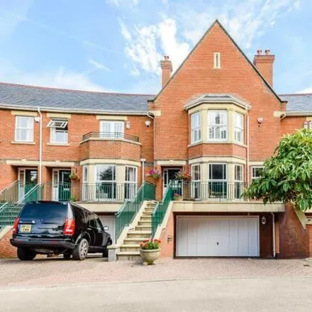 Rent this 4 bed townhouse on Sandy Lane in Virginia Water, United Kingdom
