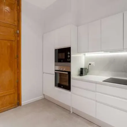 Rent this 4 bed apartment on Babula Bar 1937 in Carrer de Pau Claris, 139
