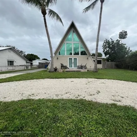 Buy this 4 bed house on 5267 Northwest 77th Court in Broward County, FL 33073