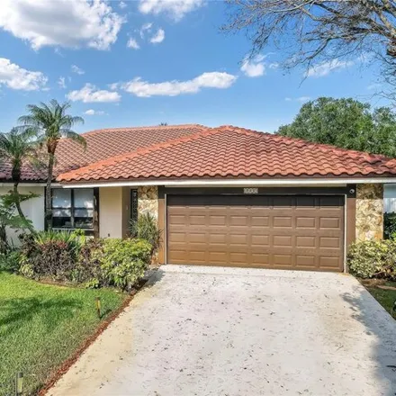 Buy this 4 bed house on 4087 Northwest 72nd Avenue in Coral Springs, FL 33065