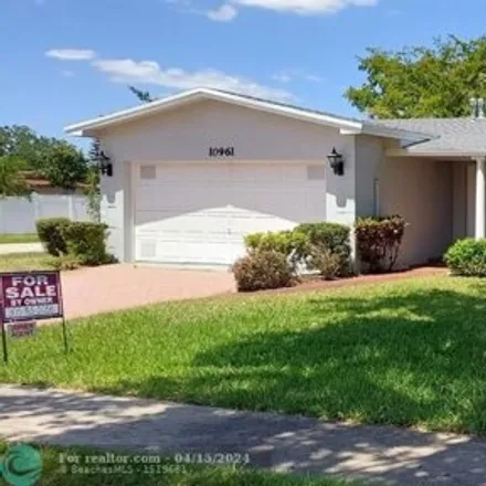 Buy this 4 bed house on 1607 Northwest 110th Avenue in Pembroke Pines, FL 33026