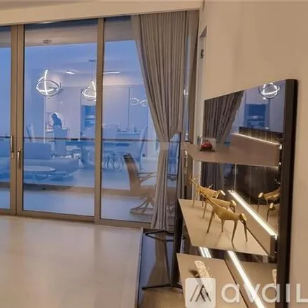 Rent this 3 bed condo on 18975 Collins Ave