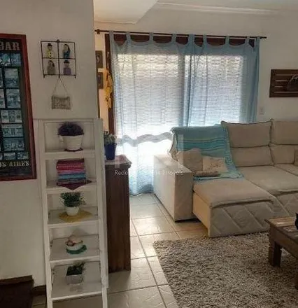 Buy this 3 bed house on Rua dos Guenoas in Espírito Santo, Porto Alegre - RS
