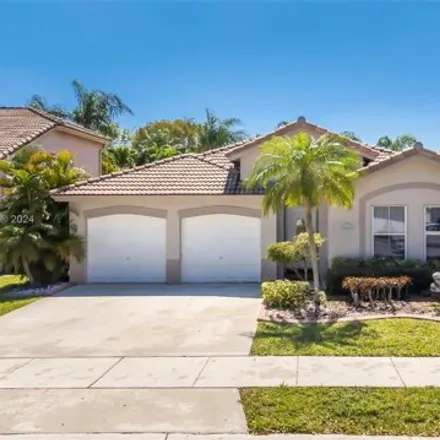 Buy this 4 bed house on 13719 South Garden Cove Circle in Davie, FL 33325