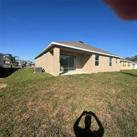 Rent this 3 bed house on unnamed road in Kissimmee, FL