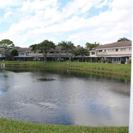 Rent this 2 bed townhouse on 2113 Discovery Circle West in Crystal Lake, Deerfield Beach