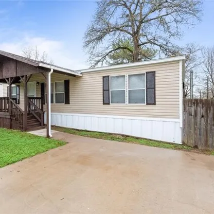 Rent this 3 bed house on 9642 Live Oak Trl in Willis, Texas