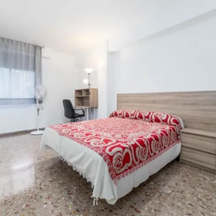 Rent this 5 bed room on Avinguda del Cid in 46014 Valencia, Spain