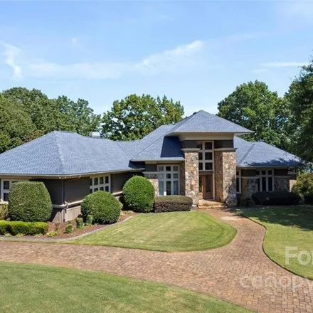 Buy this 4 bed house on 18210 Town Harbour Road in Cornelius, NC 28031