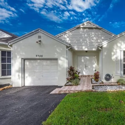 Rent this 3 bed condo on 7691 Forest Green Lane in Palm Beach County, FL 33436