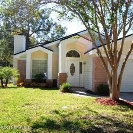 Rent this 3 bed house on 2030 The Woods Drive in Jacksonville, FL 32246