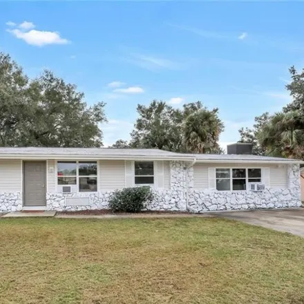 Buy this 3 bed house on 1197 Doyle Road in Deltona, FL 32725