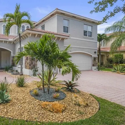 Rent this 6 bed house on Cobblestone Point Circle in Palm Beach County, FL 33472
