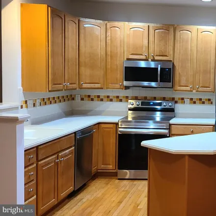 Rent this 3 bed townhouse on 1515 Pangbourne Way in Anne Arundel County, MD 21076