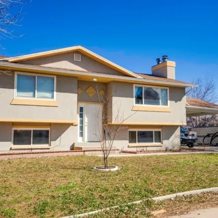 Buy this 4 bed house on 4433 S Woodgrove Dr W in West Valley City, Utah