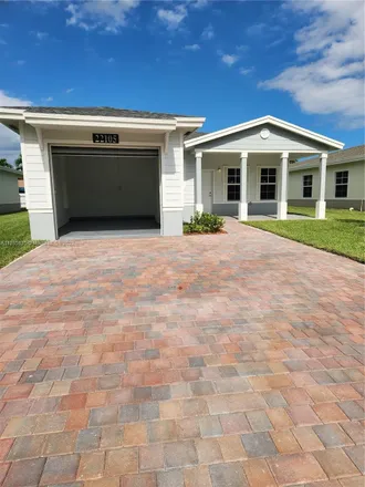 Rent this 3 bed house on 22101 Miami Avenue in Goulds, FL 33170
