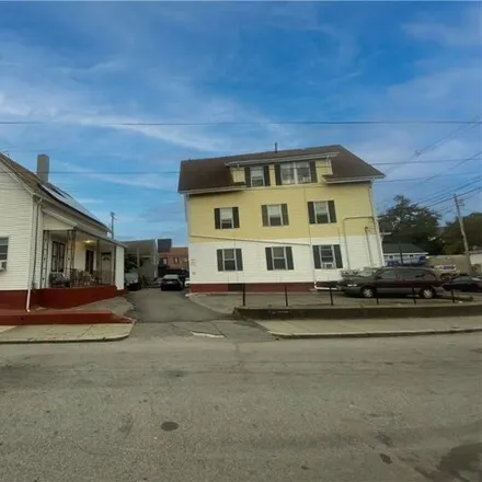 Buy this 13 bed house on 857 Dexter Street in Central Falls, RI 02863