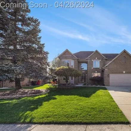 Buy this 4 bed house on 54469 Joseph Ronald Drive in Macomb Township, MI 48042