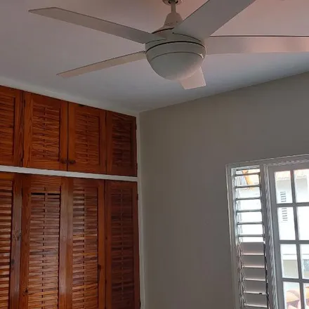 Rent this 2 bed townhouse on College Green Avenue in Mona, Jamaica