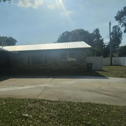 Buy this 4 bed house on 1998 Robinhood Court in Brevard County, FL 32796