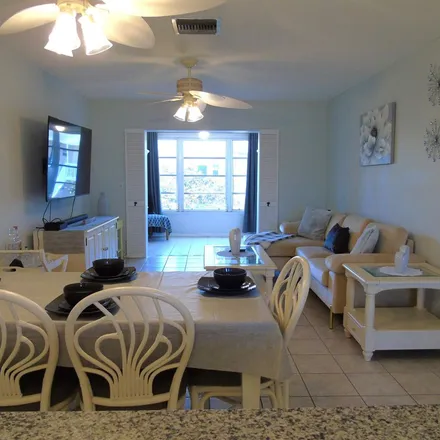 Rent this 2 bed apartment on 2127 Northeast 1st Court in Boynton Beach, FL 33435