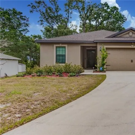 Rent this 3 bed house on 502 E Division St in Deland, Florida