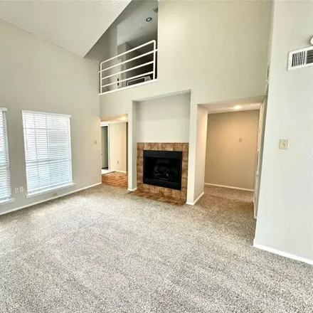 Rent this 3 bed townhouse on 13115 Burning Log Lane in Dallas, TX 75243