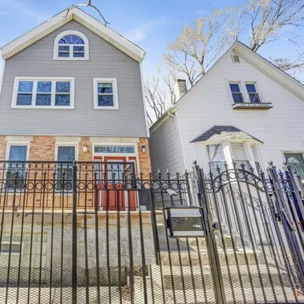 Buy this 4 bed house on 2960 North Oakley Avenue in Chicago, IL 60618
