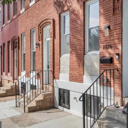 Buy this 5 bed house on 1026 North Fulton Avenue in Baltimore, MD 21217