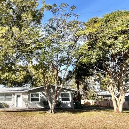 Buy this 4 bed house on 1042 Tanglewood Lane in Melbourne, FL 32935