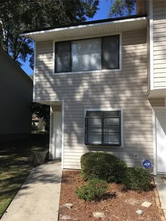Rent this 2 bed townhouse on 6180 Southwest 8th Lane in Alachua County, FL 32607