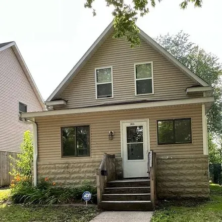 Rent this 3 bed house on 1411 N Oliver Ave in Minneapolis, MN 55411