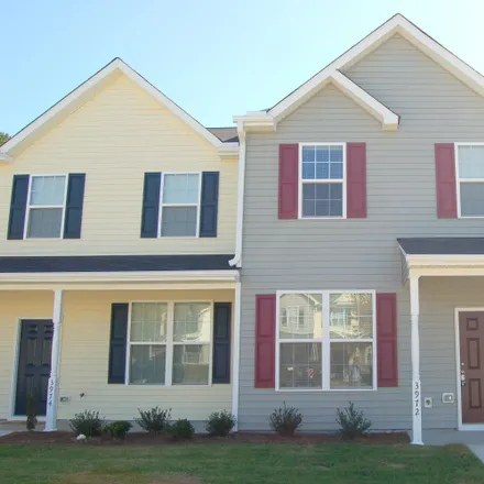 Rent this 4 bed townhouse on 3972 Volkswalk Place in Raleigh, NC 27610