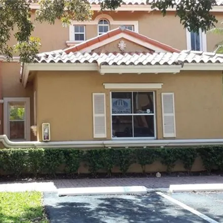 Rent this 3 bed townhouse on 8505 Northwest 140th Street in Miami Lakes, FL 33016