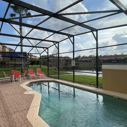 Rent this 4 bed apartment on 8501 Bay Lilly Loop in Osceola County, FL 34747