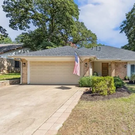 Buy this 3 bed house on 1516 Tiffany Forest Lane in Grapevine, TX 76051
