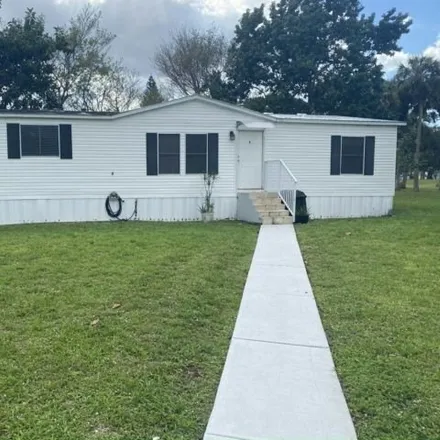 Buy this studio apartment on 17th Court North in Palm Beach County, FL 33417