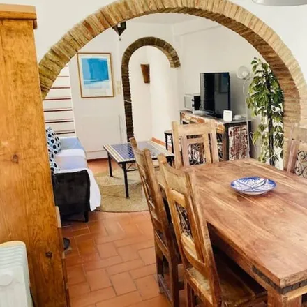 Rent this 2 bed townhouse on 11380 Tarifa