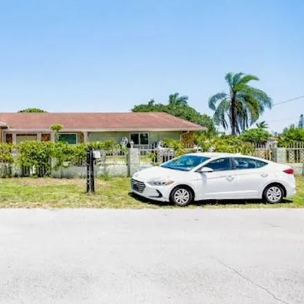 Buy this 5 bed house on 17191 Northwest 18th Avenue in Scott Lake, Miami Gardens