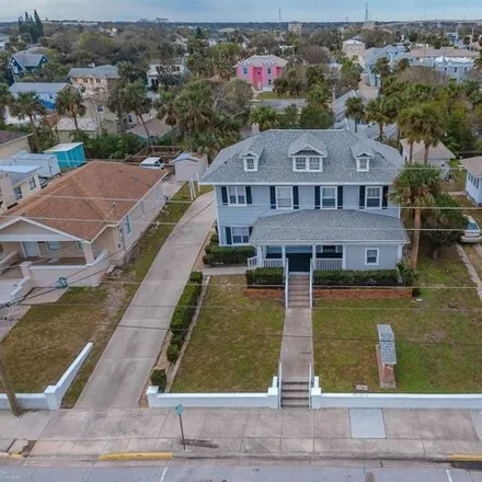 Buy this 6 bed house on 431 North Grandview Avenue in Daytona Beach, FL 32118