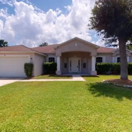Rent this 4 bed apartment on 27 Buffalo Meadow Lane in Indian Trails, Palm Coast
