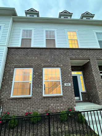 Rent this 3 bed townhouse on 832 Kinzer Avenue