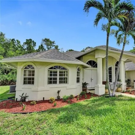 Buy this 4 bed house on 14735 68th St N in Loxahatchee, Florida