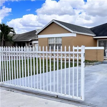 Rent this 3 bed house on 20121 Nw 32nd Ave in Miami Gardens, FL