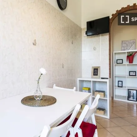 Rent this 4 bed room on Via Amerigo Vespucci in 20094 Cesano Boscone MI, Italy