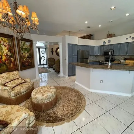 Rent this 5 bed apartment on 4999 Chardonnay Drive in Hidden Hammocks Estates, Coral Springs