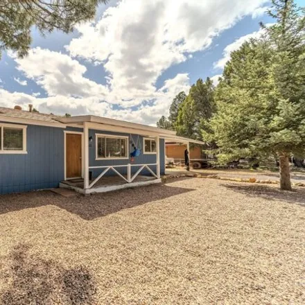 Buy this 2 bed house on 601 North 9th Drive in Show Low, AZ 85901