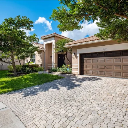 Buy this 5 bed house on 1539 Cardinal Way in Weston, FL 33327