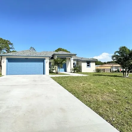 Rent this 3 bed house on 460 Gregory Street in Collins Park Estates, Saint Lucie County